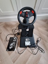Racing steering wheel and peddles