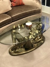 Lying naked woman coffee table 1