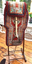 Mongolian Camel Saddle/Rug with felt lining and heavy vintage ornate stirrups (