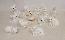 SET OF 12 ROYAL OSBORNE BONE CHINA ANIMAL FIGURES.