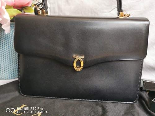 Genuine launer london - genuine,
