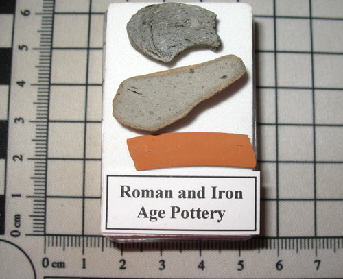 Roman iron age pottery shard - &,