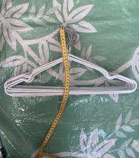 TEN  clothes hangers made of steel wire, anti skid surface, off white colour