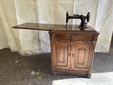 ANTIQUE NEW HOME SEWING MACHINE IN PARLOR CABINET MAHOGANY 