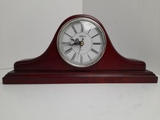 Highlands Clock, With Roman Numerals And A Cherry Coloured Wooded Base 16.5 X 8"
