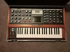 Minimoog Voyager Signature edition Cherry Finish With Flight Case. 
