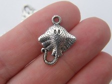 8 Stingray charms antique
