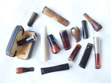 Cigar & cheroot holders, a