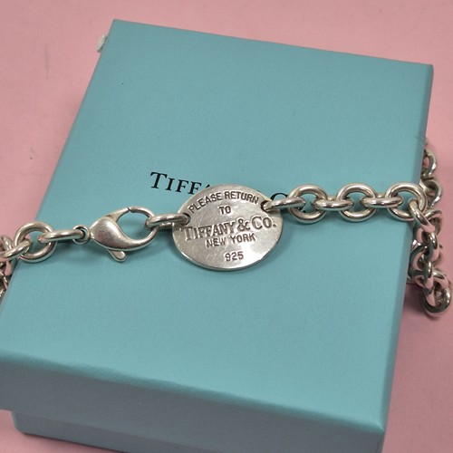 Tiffany genuine round - tiffany, &