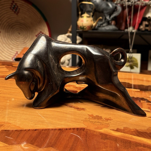 Vintage abstract charging bull - charging,