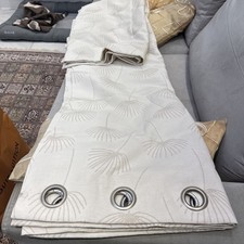 eyelet curtains in a cream or