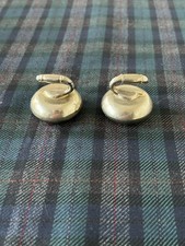 Two white metal Mini Curling