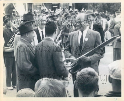 1958 man holding giant - 1958,