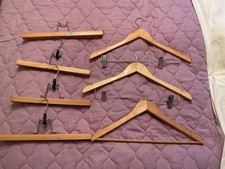 7 VINTAGE WOODEN HANGERS