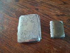 Antiques E.P.N.S. cigarette case and book shaped vesta case,stamp holder.