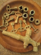old barrel tap  keys and tops 