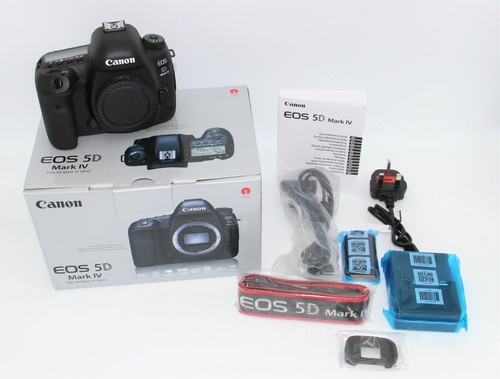 New canon eos iv - new.,