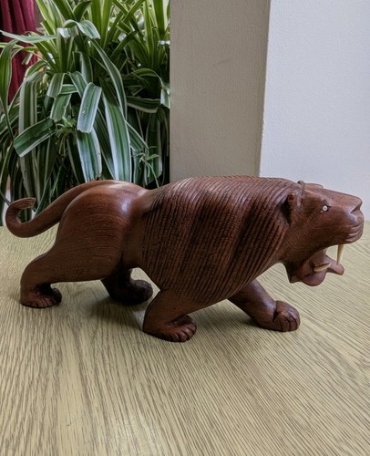 Hand carved hardwood lion - hand,