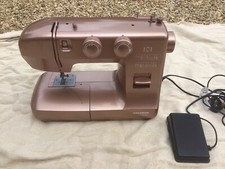 LIGHTWEIGHT EASTMAN TAILOR (ROSE GOLD) SEWING MACHINE. MODEL: ES22.