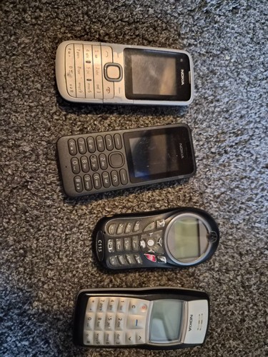 Four old mobile phones