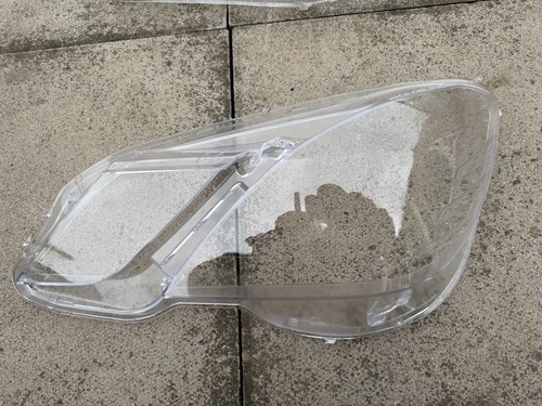 Left front headlight lens - left,