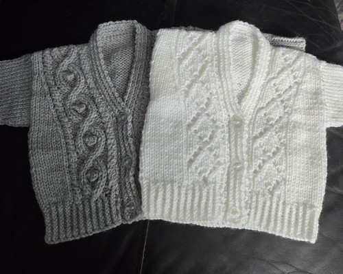 Hand knit baby cardigans - x,