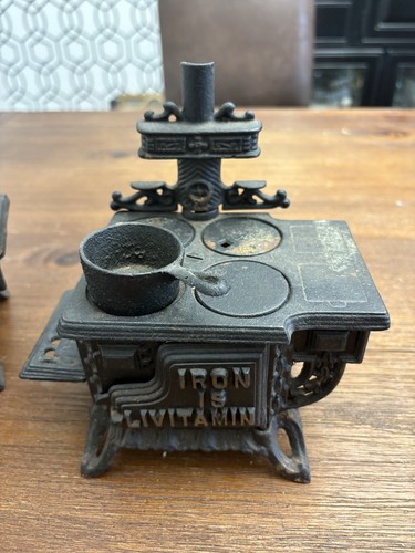 Miniature cast iron salesman - miniature,