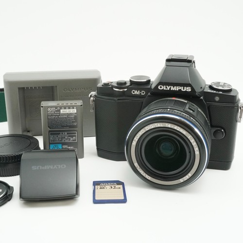 Olympus black - om-d, +