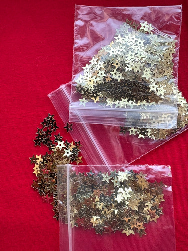 Approx 1000 loose flat gold - approx.,