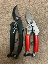 a set of pruner secateurs, one