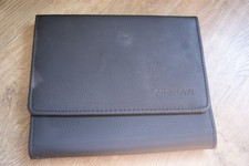 NISSAN  OWNERS MANUAL WALLET , EMBOSSED LOGO  DESIGN GENUINE QUALITY  ITEM
