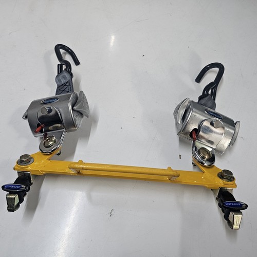 Straint retractors on bar - q,