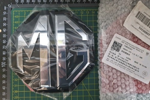 Genuine new grille badge - genuine,