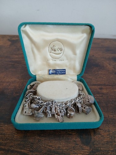 Vintage nuvo silver charm - nuvo,