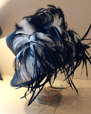 John Lewis Fine black straw weaved with black & white feathered Ladies hat