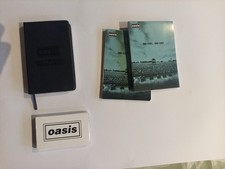 Selection Of Oasis Promo Note Pads And WTSMG Cassette