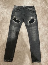 Zara Men’s Ripped Jeans -