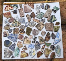 Antique pottery tiles, great colours and designs recovered from old bottle dump