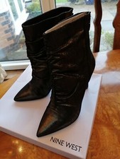 Designer boots size 8 Nine