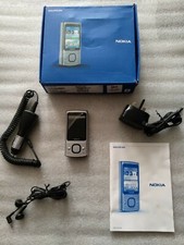 Nokia 6700 Slide, Raw Aluminium, Mobile Phone On Virgin, Excellent Condition.