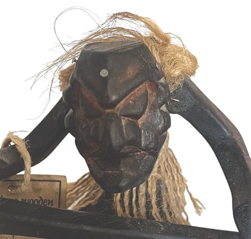 Awesome wooden tiki hand - awesome,