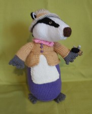 Badger in a jacket and hat