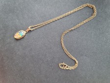 Beautiful Opal Pendant Set In A 9ct Gold. Fine Gold Chain and Pendant