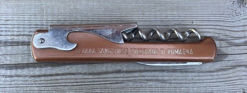 Vintage corkscrew and - corkscrew, bottle