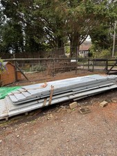 50 sheets 12ft corrugated tin roofing sheets.  Pre-owned but not used, no holes.