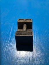 CAST IRON TWO POUNDS WEIGHT LIKE 56LB WEIGHT 11