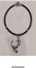 code A63 Fallow Deer Head charm on a silver Faux Leather Snake Bracelet 