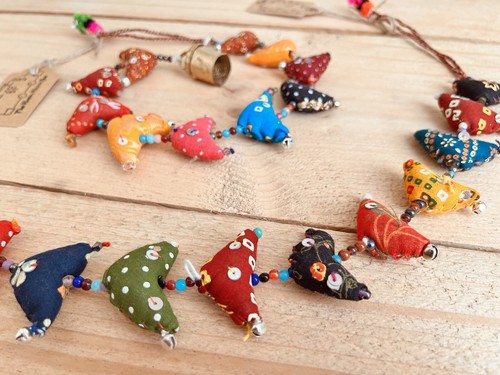 Fair trade bird bell tota - trade,