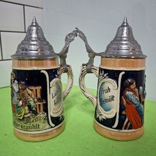 German Beer Steins With Hinged Lids X 2 14cm Tall.