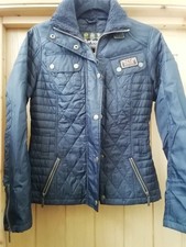 Woman's Barbour international quilted jacket. Size 8 .